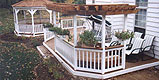 Wooden Deck with Pergola & Gazebo by Elyria Fence